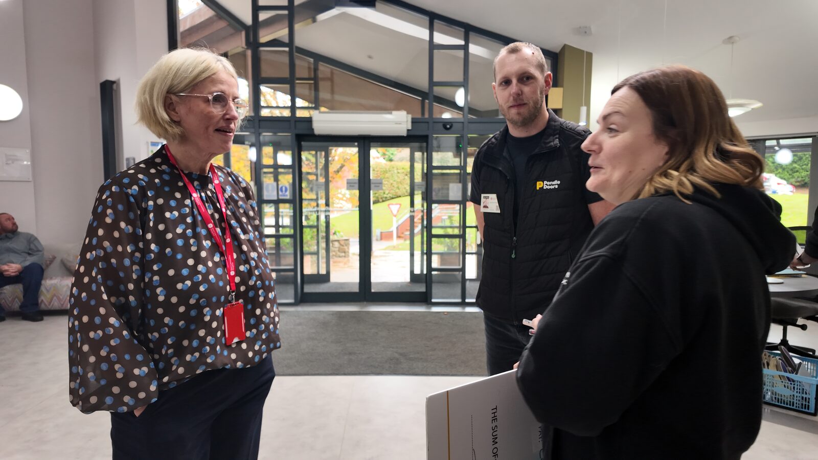 Pendle Doors team speaking with staff at East Lancashire Hospice